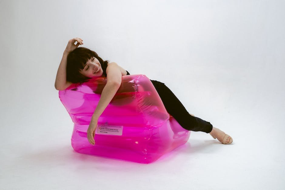 Image of the 90s Grunge Revival depicting ripped jeans, oversized flannel shirts, band tees, faded denim jackets, and combat boots.